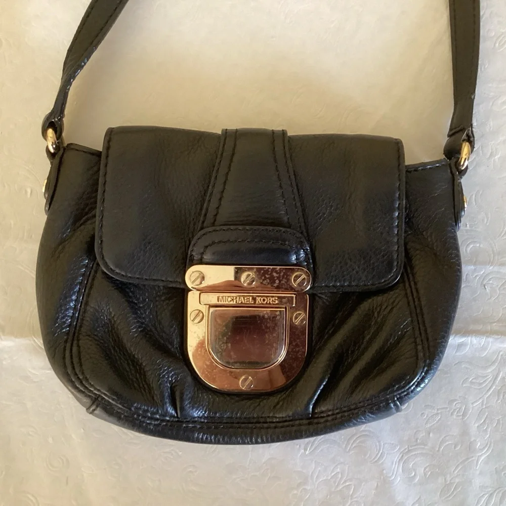 Michael Kors Black Charlton Mini Crossbody Leather Purse With Gold Buckle.